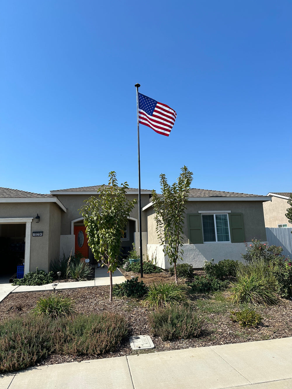 The Easiest Way to Installing a Flagpole in the Front Yard